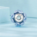 Blue Murano Glass with Raised Floral Accents Charm