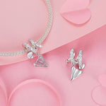 Crystal-Studded Heart Spiral with Pink Paper Plane Charm