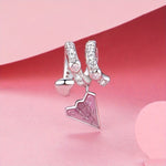 Crystal-Studded Heart Spiral with Pink Paper Plane Charm