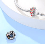 Glowing Ruby-Eyed Snake Charm