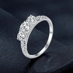 Letoton Three-Stone Moissanite Ring