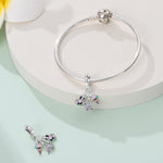 Parisian Guitar, Eiffel Tower, Butterfly, & Floral Ice Cream Triple Dangle Charm