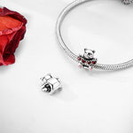 Smiling Bear Holding Red Hearts Charm
