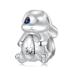 Winking Bunny with Heart-Shaped Egg Charm