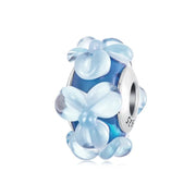Blue Murano Glass with Raised Floral Accents Charm