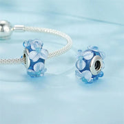 Blue Murano Glass with Raised Floral Accents Charm