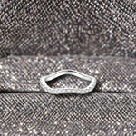 Elegant Sterling Silver Wavy Ring with Crystal Highlights