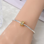 Golden Geometric with Blue and Clear Stones Clip Charm