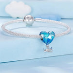 Heart Traveler Globe and Airplane Charm