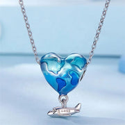 Heart Traveler Globe and Airplane Charm