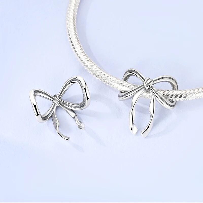 Silver Bow charm detail view