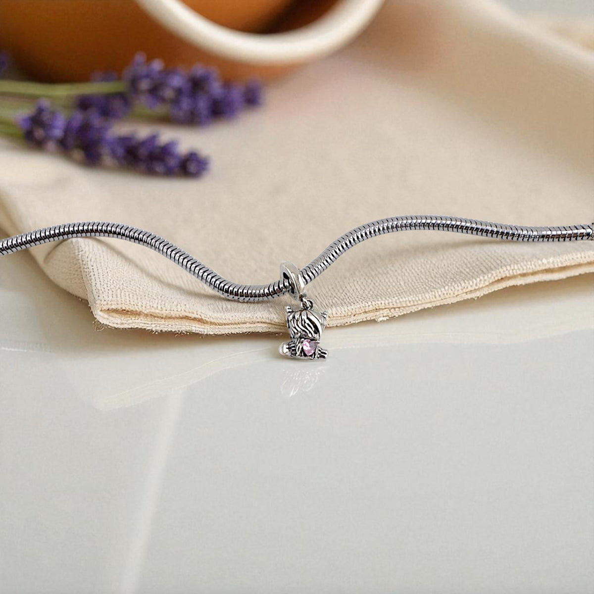 Baby Highland Cow Girl charm detail view