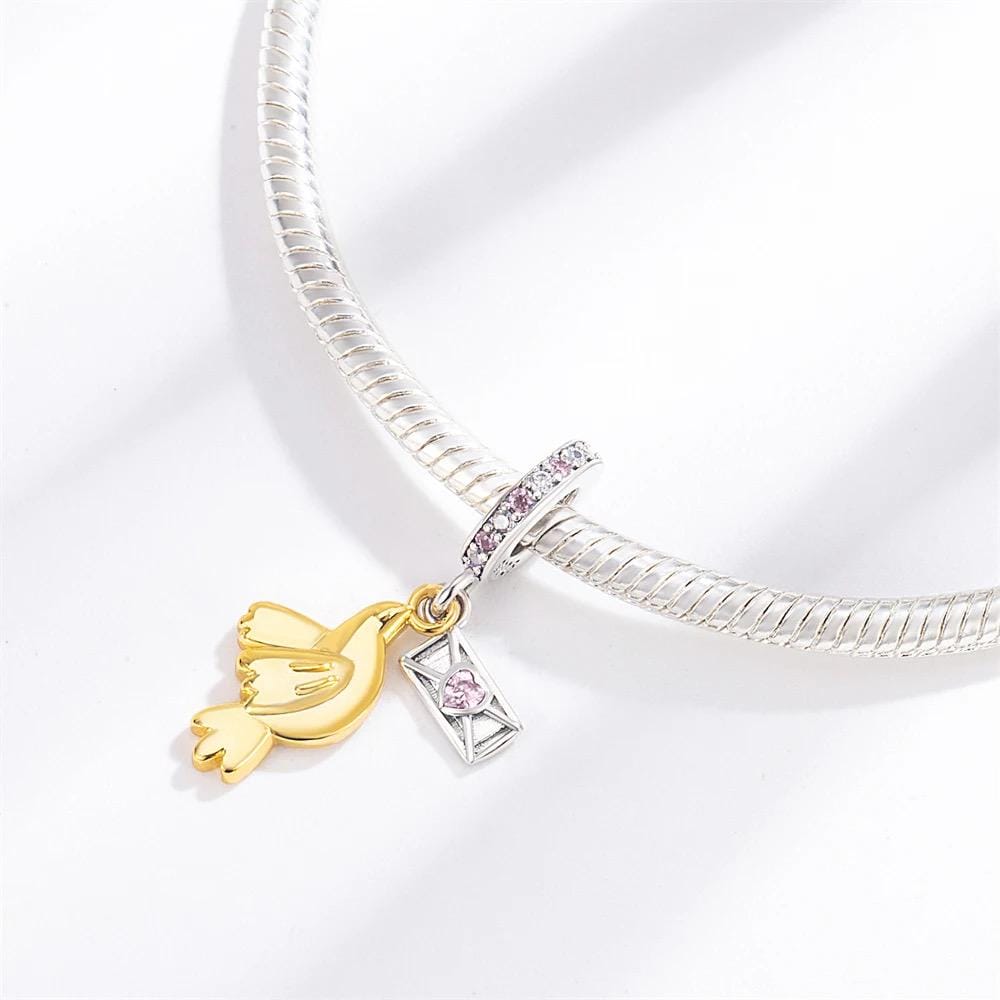 Pigeon Love Letter charm detail view