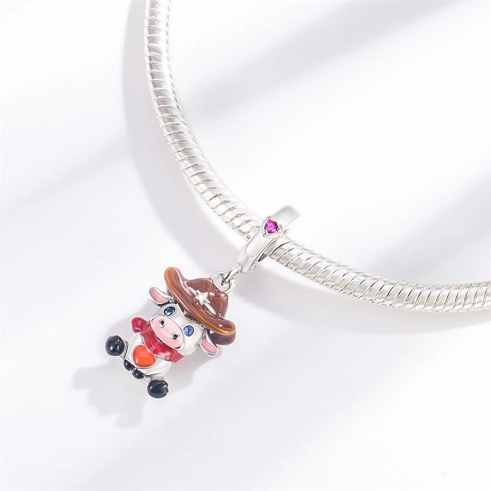 Cowboy Cow charm detail view