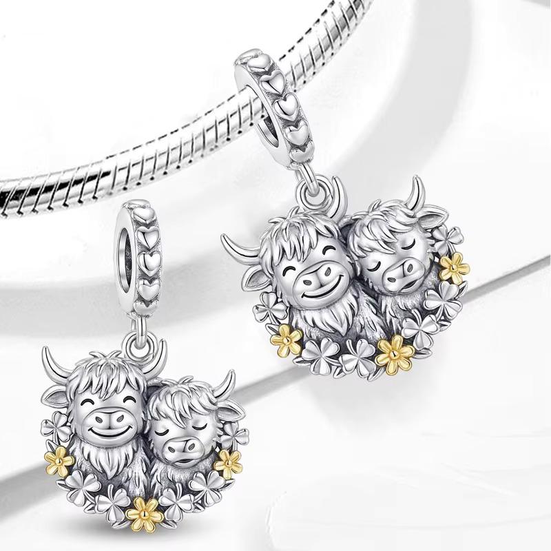 Highland Cow Mother Calf charm detail view