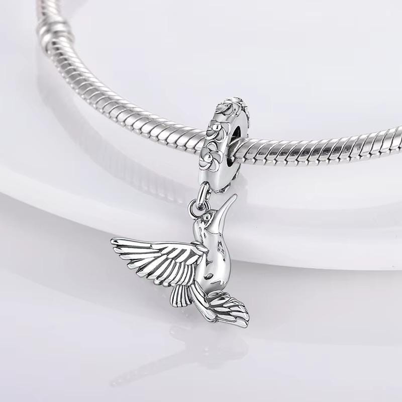 Hummingbird charm detail view
