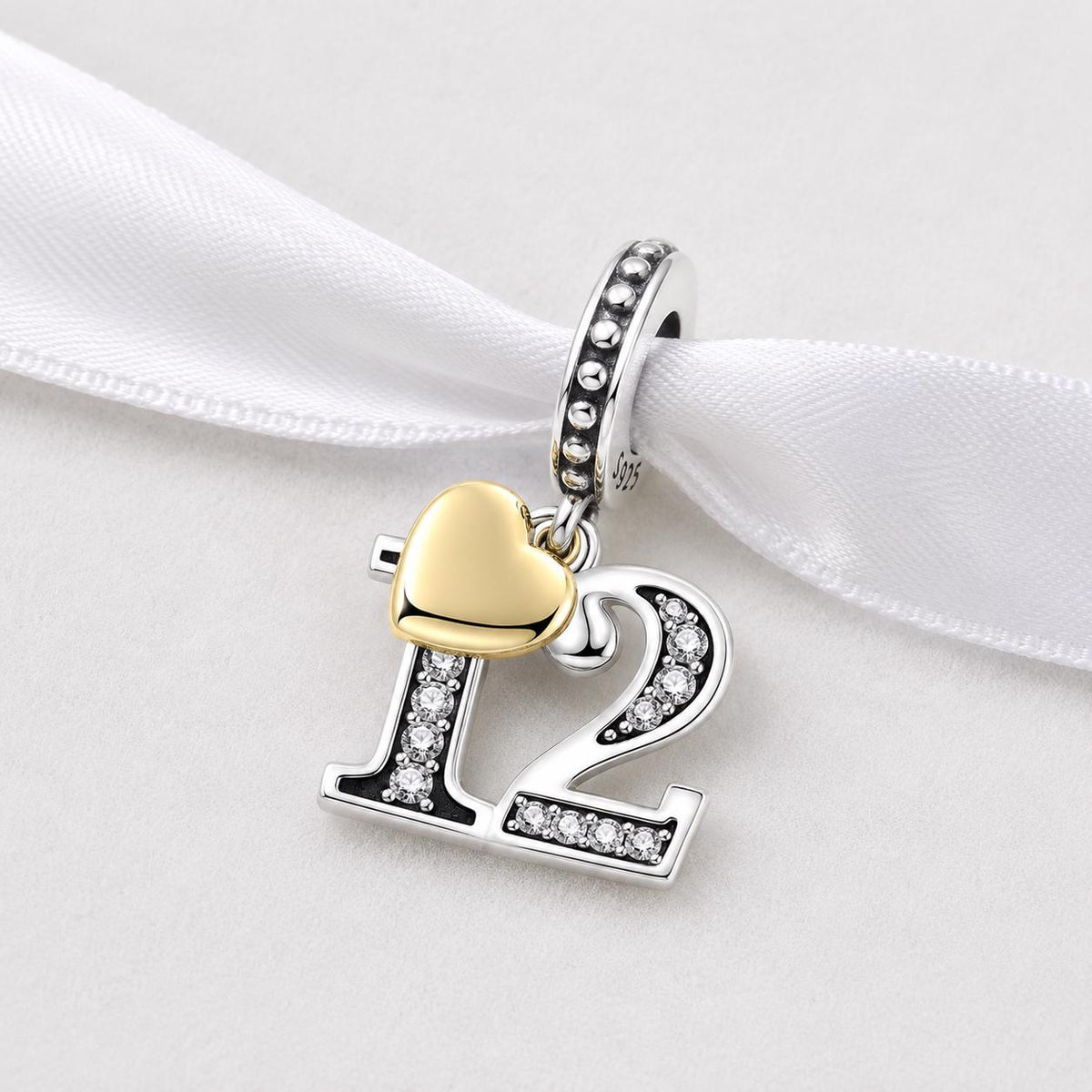 Number 12 sterling silver charm alternate view