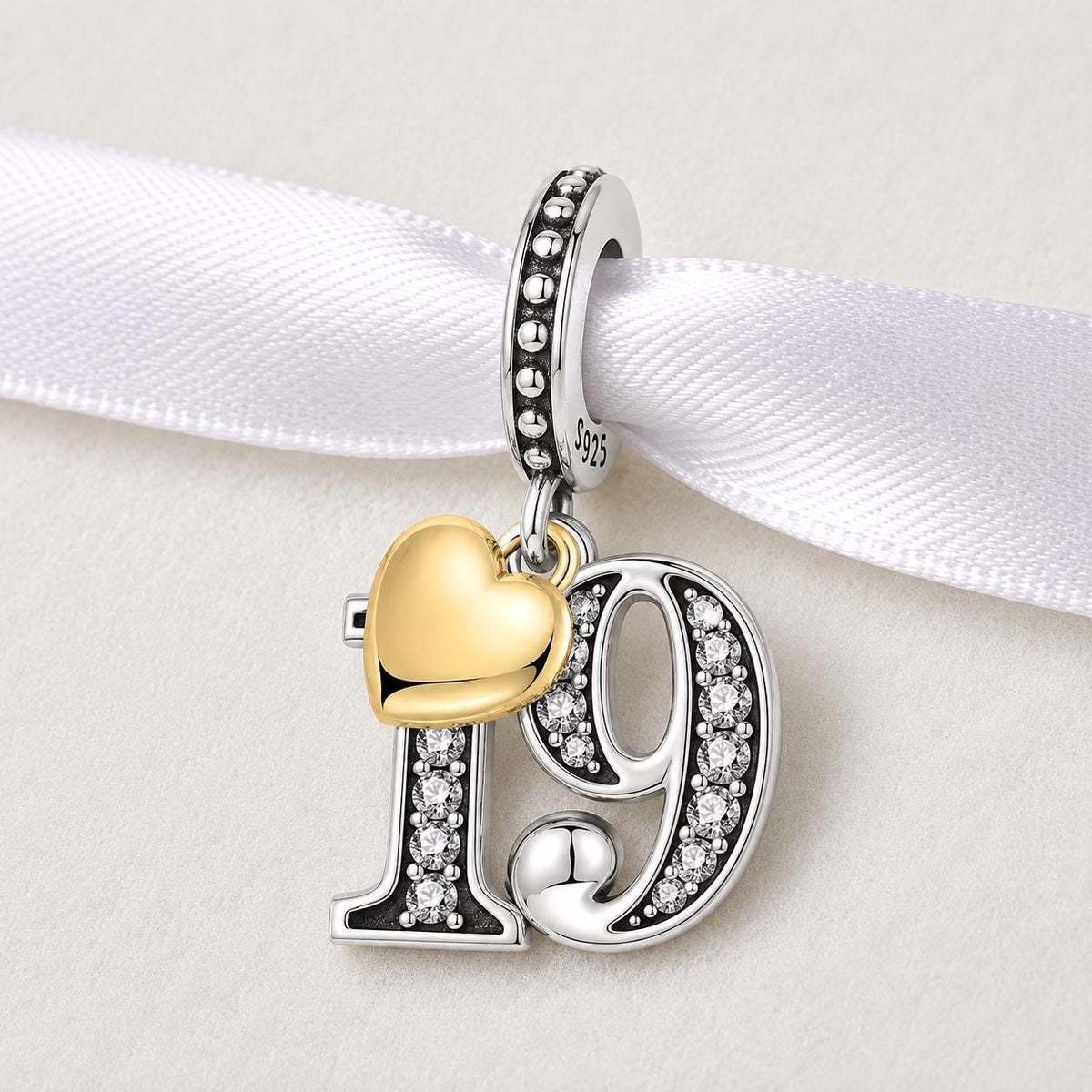Number 19 sterling silver charm alternate view