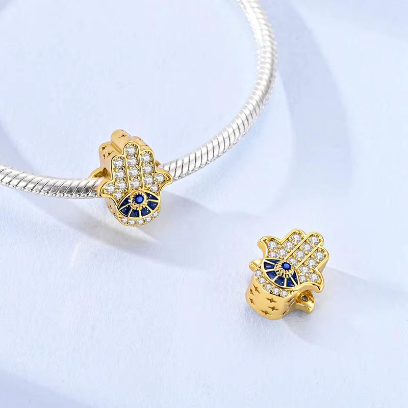 Gold Hamsa Hand charm detail view
