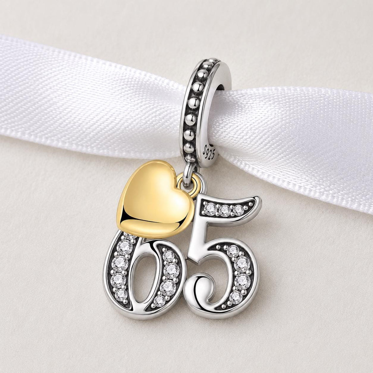 Number 65 sterling silver charm alternate view