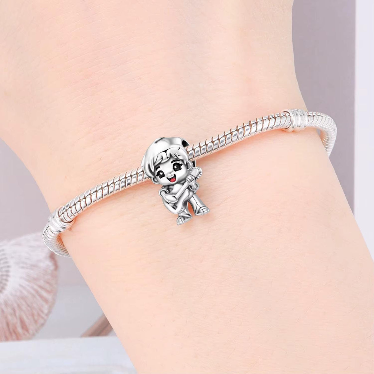 Guitarist charm detail view