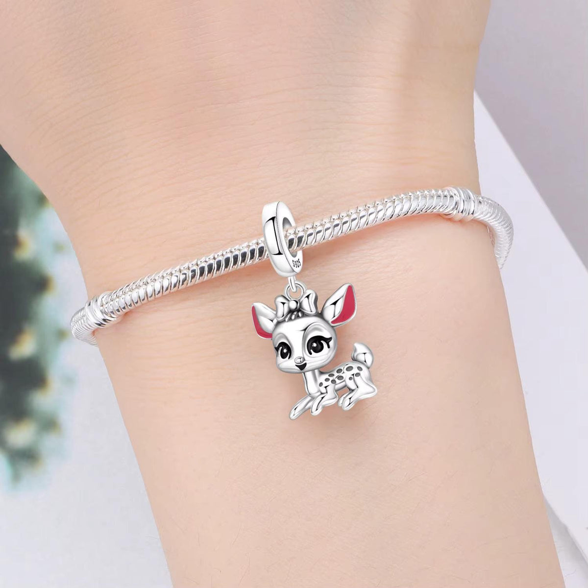 Deer charm detail view