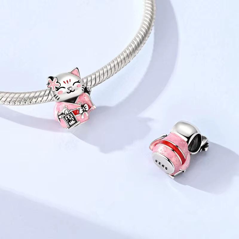 Lucky Cat charm detail view