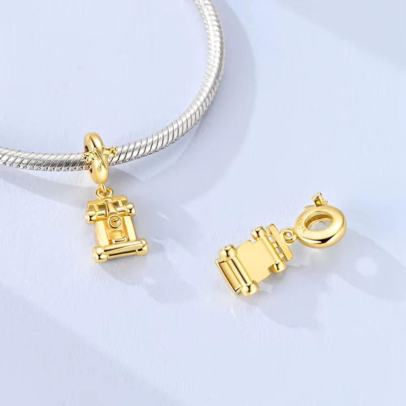Gold F1 charm detail view