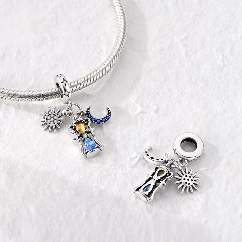Sun Moon Hourglass charm detail view