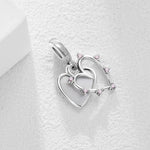 Intertwined Hearts with Pink Accents Charm