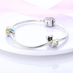 Luminous Sun and Moon Charm