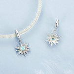 Radiant Sunburst with Opal Heart and Pastel Accents Dangle Charm