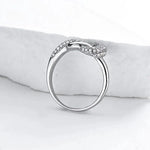 Sterling Silver Infinity Knot Ring with Pavé Diamonds
