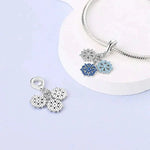 Triple Snowflake Charm with Sparkling Blue and White Crystals