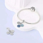 Triple Snowflake Charm with Sparkling Blue and White Crystals