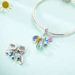 Whimsical Snail on Flower Bloom Dangle Charm