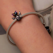 Winged Black Cat with Colorful Eyes Charm