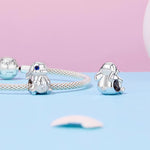 Winking Bunny with Heart-Shaped Egg Charm