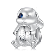 Winking Bunny with Heart-Shaped Egg Charm
